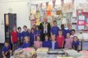Councillor Stuart Thom with youngsters at Brandlehow Primary