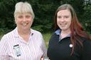 Christine Wicks, County Commissioner with Anna McPhie after presenting her with her Queen's Guide badge.