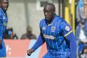 Staying on his feet: Adebayo Akinfenwa drew a blank in Saturday's draw with Wycombe Wanderers