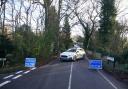A police cordon on War Coppice Road leading to Gravelly Hill in Caterham, Surrey, where a dog attacked members of the public on Thursday