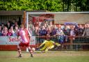 Dave Hodges, making his 300th appearance for Corinthian-Casuals, sees his decisive penalty saved by Slavomir Huk. Picture: Stuart Tree