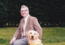 Chris Gilroy with one of his guide dogs, Bailey