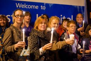 SUNDAY AM KIN/SC/ELM Nurses hold candlelight vigil against hospital cuts