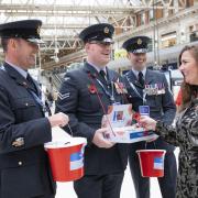 Armed Forces personnel at Waterloo station during the 2022 Poppy Day appeal