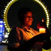 Nurse Sanyu Kasule at the London Eye remembering her colleagues and those lost