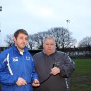 Team captain Gavin Bulger and reserve team manager Terry Tuvey with the torn cables