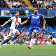 Fine evening's work: Chelsea's Eden Hazard scored the goal that denied Tottenham Hotspur a shot at the Premier League title