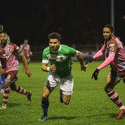 Corinthian-Casuals (pink shirts) gave a spirited performance against Dulwich Hamlet on Tuesday night. Picture: Stuart Tree