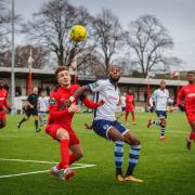 Casuals Gabriel Odunaike holds off a Carshalton defender in the 0-0 draw. Picture: Stuart Tree