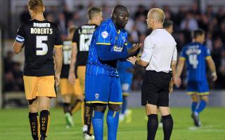 Making a point: Adebayo Akinfenwa reckons AFC Wimbledon's strength in depth is key to their League Two successes