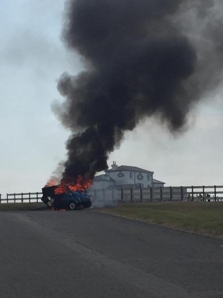 Surrey Comet: Car fire witnessed near to The Rubbing House on Epsom Downs. Image: Pat Flower