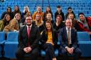 Peter Ashurst, Monica Harding and Dominic Raab with students at Esher Sixth Form College. Image: Surrey Advertiser.