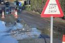 Villagers in Lambourn, West Berkshire put up a mocking sign after the wastewater spilled above ground level. Credit: SWNS
