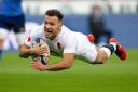 Smiler: Danny Care dives over to open the scoring in France as England seal the RBS Six Nations Grand Slam for the first time in 13 years                 Picture: Getty