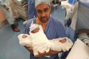 Father Bilal Javaid with the newborns last week