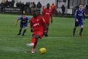 Omar Koroma tucks away his penalty for Carshalton Athletic. Picture: Ian Gerrard