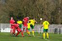 Daryl Cooper-Smith heads home to put Sutton Common Rovers ahead at Godalming Town
