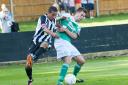 Goal-scorer: Leatherhead's Tom Parkinson does battle with Tooting's Troy Williams    SP73087