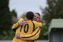 Happier times: Leon McDowell (10) celebrates his strike against Cove with Taylor Mollatt