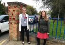 •	Poppy display at the entrance of Epsom Hospital - Sophie Bevan, Head of Patient Experience and Partnership and Jo Brittan Patient Experience Manager. Image: ESHT