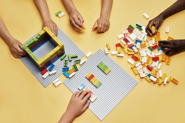 Surrey Comet: Children playing with LEGO. Credit: PA