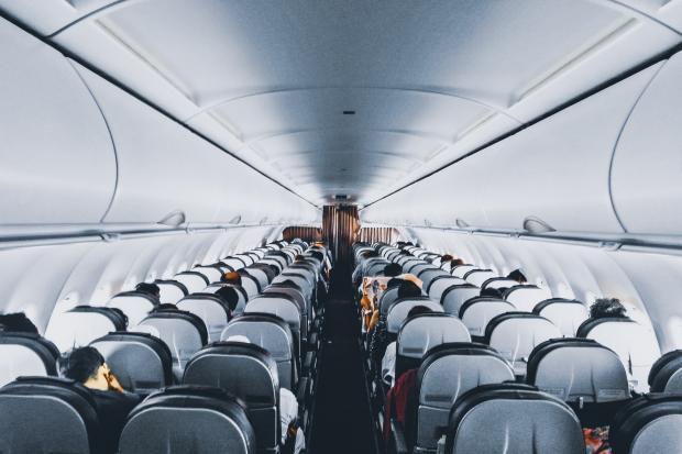 Surrey Comet: Rows of empty seats on a plane. Credit: Canva