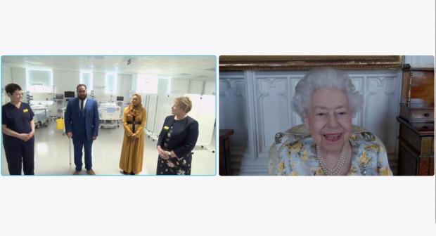 Surrey Comet: Queen Elizabeth II speaking to Dr Marie Healey, Divisional Director for Surgery and Critical Care; Mr Asef and Mrs Shamina Hussain; and Jackie Sullivan during a video link call (PA)