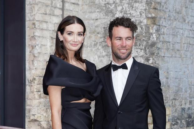 Mark Cavendish and wife Peta. Picture: PA