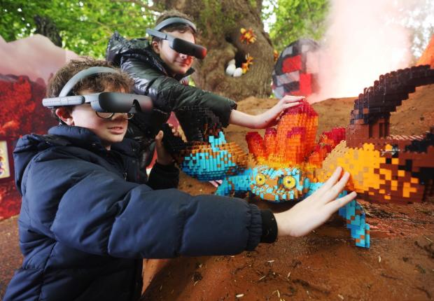 Surrey Comet: Lucca and Sonny using the eSight eyewear as they explored the Magical Forest (LEGOLAND Windsor)