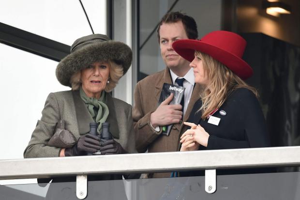 Surrey Comet: The Duchess of Cornwall with her son Tom Parker-Bowles (centre) and daughter Laura Lopes (Joe Giddens/PA)