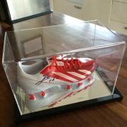 Cool prize: One of the greatest footballers of all time signed this boot