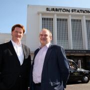 Danny Alexander and Ed Davey outside Surbiton station