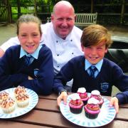 Wonder cakes: Simon Holwell with Oliver Stone and Megan Billingham, both 11