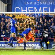 Bundle: Paul Robinson "bundles" home the decisive goal in the 1-0 win over Carlisle United on Tuesday night