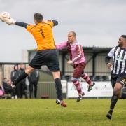 Close: Corinthian Casuals' Jamie Byatt is denied by the keeper in the 1-0 win over Peacehaven & Telscombe     Picture: Stuart Tree