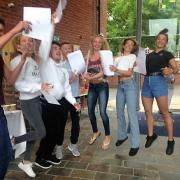 Jumping for Joy: Tom Jimena-Tilling, Antonia Turner, Elliot King, Oliver Darroch, Rosie Onslow-Wyld, Harriet Jennings and Portia Jennings celebrate their A level results at Epsom College