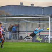 Danny Bracken can't stop a Wingate and Finchley free-kick. Picture: Stuart Tree