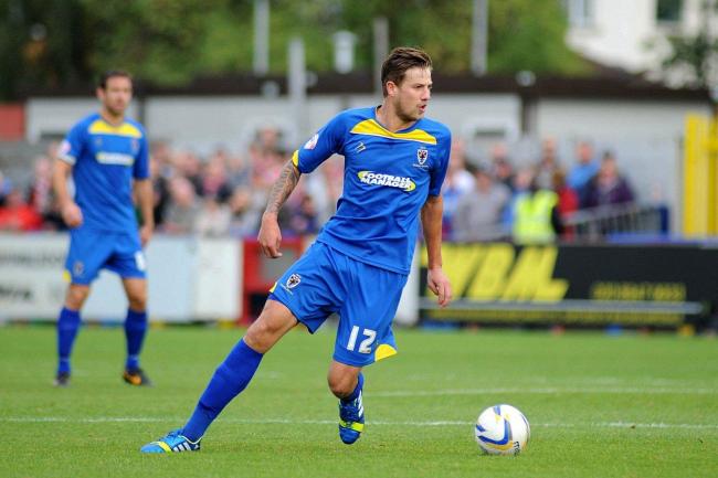 Something to prove: Harry Pell has a month at Grimsby Town to prove he is worthy of more game time at AFC Wimbledon           SP79026